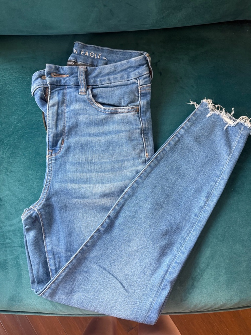 American Eagle Outfitters Light Blue curvy High-Rise Jeggings with Raw Hem